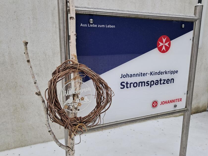 Schild der Kinderkrippe Stromspatzen