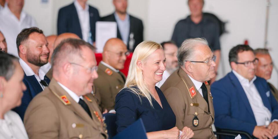 Professor Little, Staatsministerin Stolz und Landesvorstand Oliver Meermann.