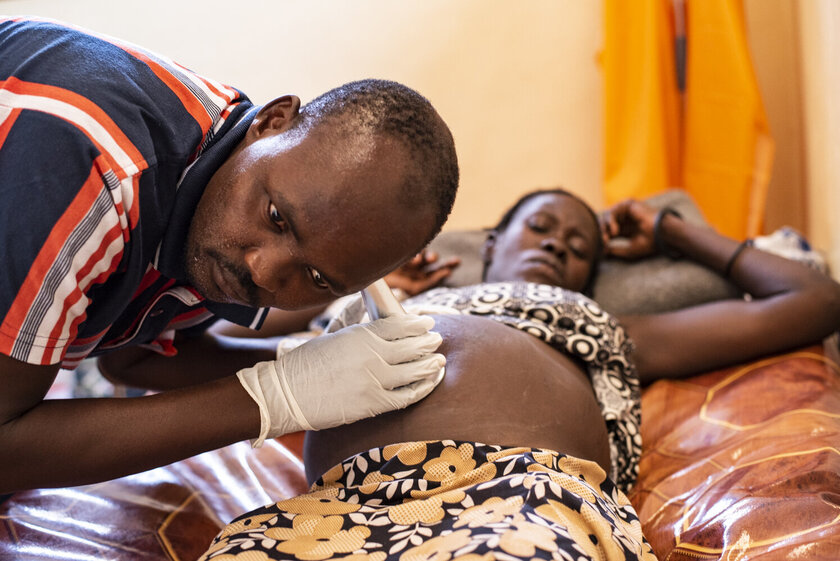 A pregnant woman is being examined